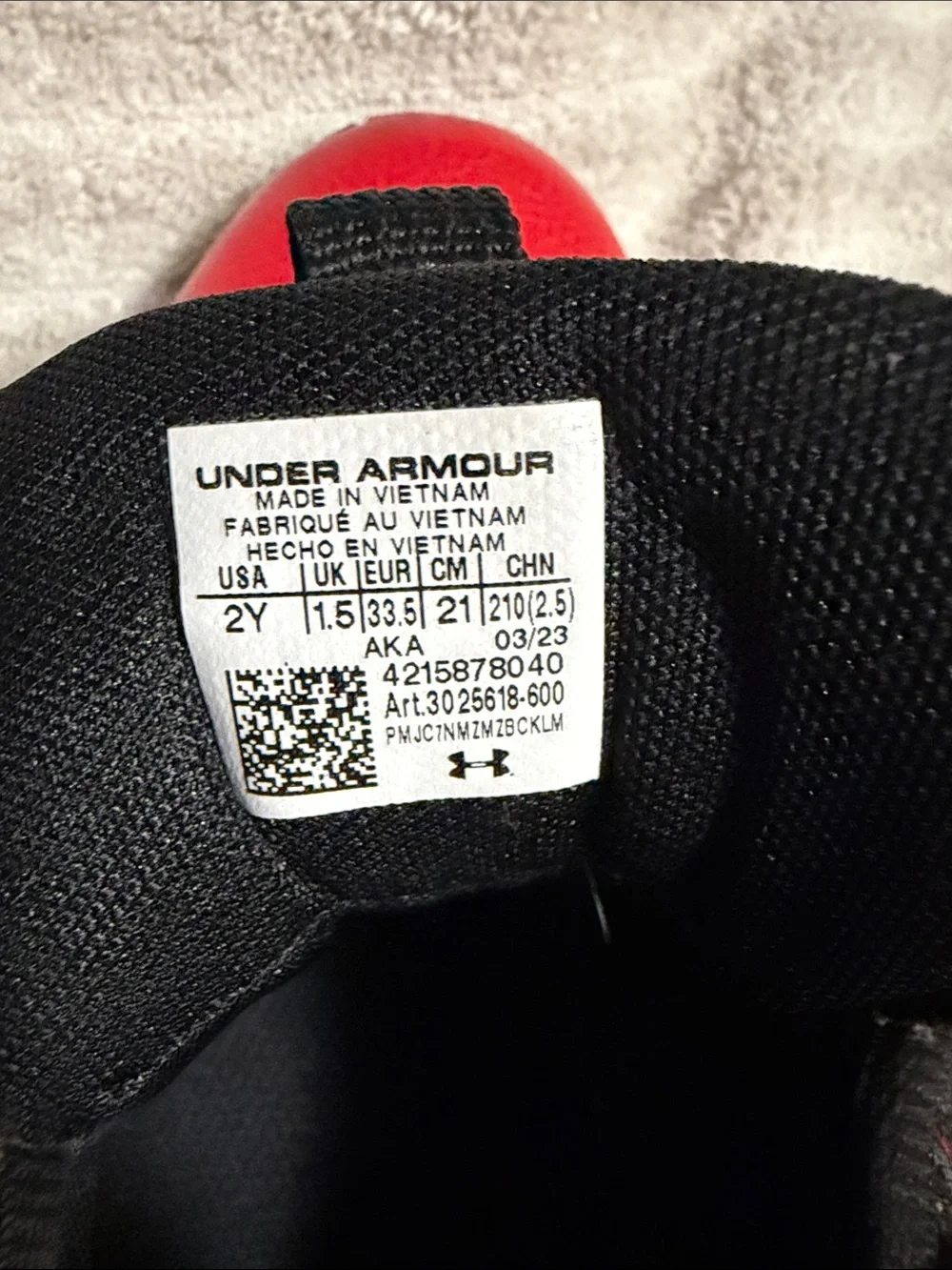Under Armour Kids Red and Black Low-Top Sneakers